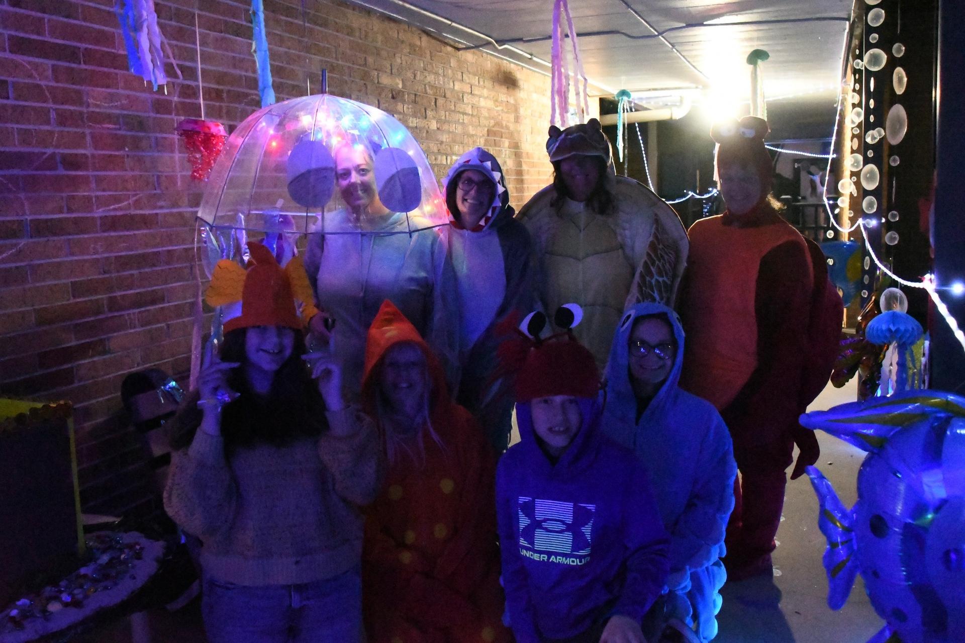 Picture of Franklin Trick-or-Treat event; staff in costumes